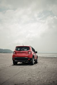 Превью обои jeep renegade, jeep, внедорожник, красный, вид сзади, пляж, бездорожье