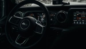 Превью обои jeep wrangler, jeep, руль, автомобиль, черный