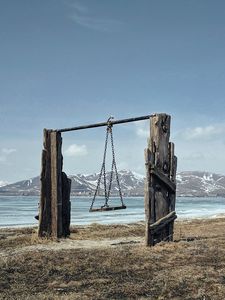 Превью обои качели, горы, море, берег
