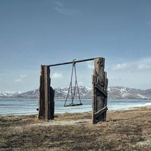 Превью обои качели, горы, море, берег