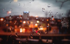 Превью обои капли, дождь, стекло, влага, окно, размытость