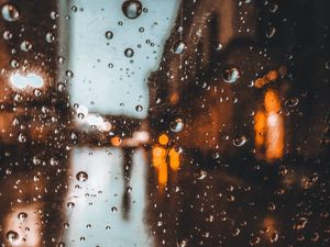 Превью обои капли, стекло, размытость, дождь, блики
