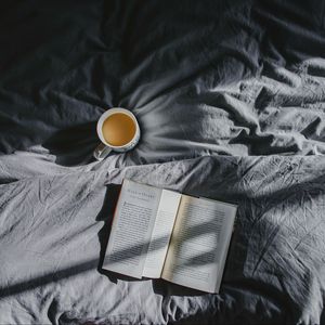 Превью обои книга, кофе, постель, тень