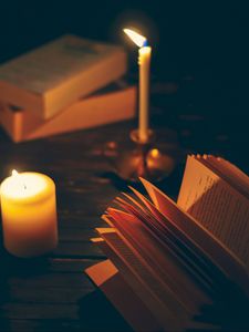 Превью обои книга, свеча, тени, чтение, уют