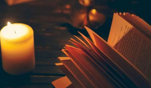 Превью обои книга, свеча, тени, чтение, уют