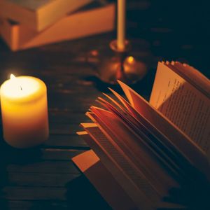 Превью обои книга, свеча, тени, чтение, уют