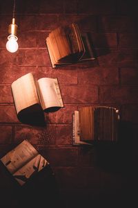 Превью обои книги, открытые книги, стена, лампа