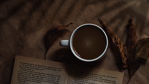 Превью обои кофе, чашка, книга, наушники, текст