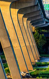 Превью обои колонны, мост, река, трава, город