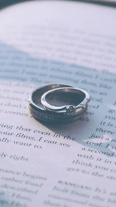 Превью обои кольца, обручальные кольца, книга, пара, любовь
