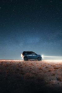 Превью обои land rover defender, land rover, автомобиль, внедорожник, серый, ночь