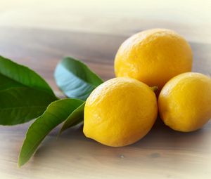 Превью обои лимоны, листья, желтые, цитрусовые