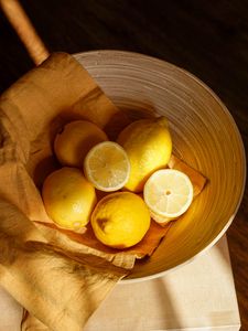 Превью обои лимоны, цитрус, долька, ткань, свет