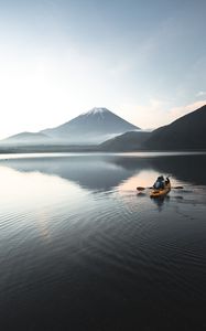 Превью обои лодка, каноэ, вулкан, море, рябь