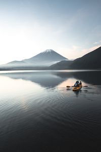 Превью обои лодка, каноэ, вулкан, море, рябь