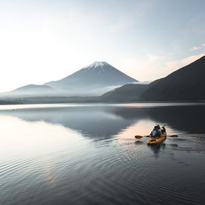 Превью обои лодка, каноэ, вулкан, море, рябь