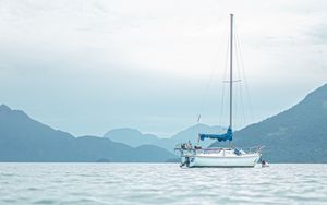 Превью обои лодка, море, холм, небо