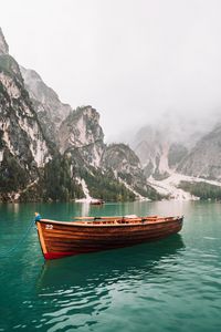 Превью обои лодка, озеро, скалы, деревья