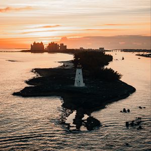 Превью обои маяк, башня, остров, море, здания, закат