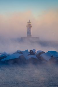 Превью обои маяк, камни, море, туман