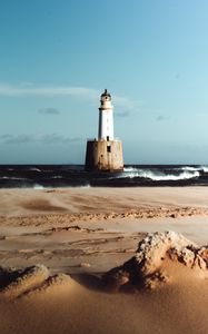 Превью обои маяк, море, песок, прибой, волны, горизонт