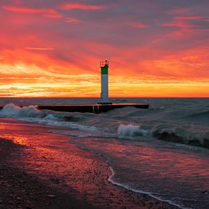 Превью обои маяк, море, закат, волны, пляж