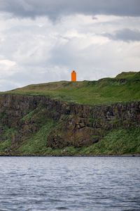 Превью обои маяк, остров, море, обрыв, трава