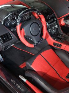 Превью обои mansory cyrus, 2009, красный, салон, интерьер, руль, спидометр, астон мартин