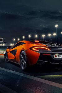 Превью обои mclaren, 570s, оранжевый, город, дорога