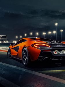 Превью обои mclaren, 570s, оранжевый, город, дорога