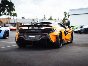 Превью обои mclaren 600lt, mclaren, автомобиль, желтый, вид сзади