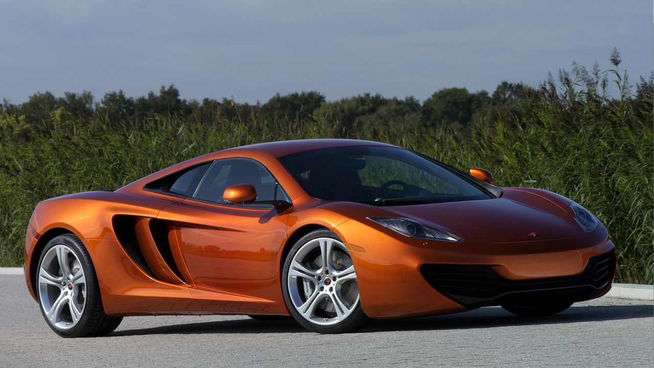 Обои mclaren, mp4-12c, оранжевый, вид сбоку