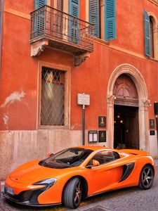 Превью обои mclaren, суперкар, оранжевый, вид сбоку