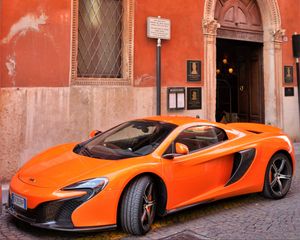 Превью обои mclaren, суперкар, оранжевый, вид сбоку