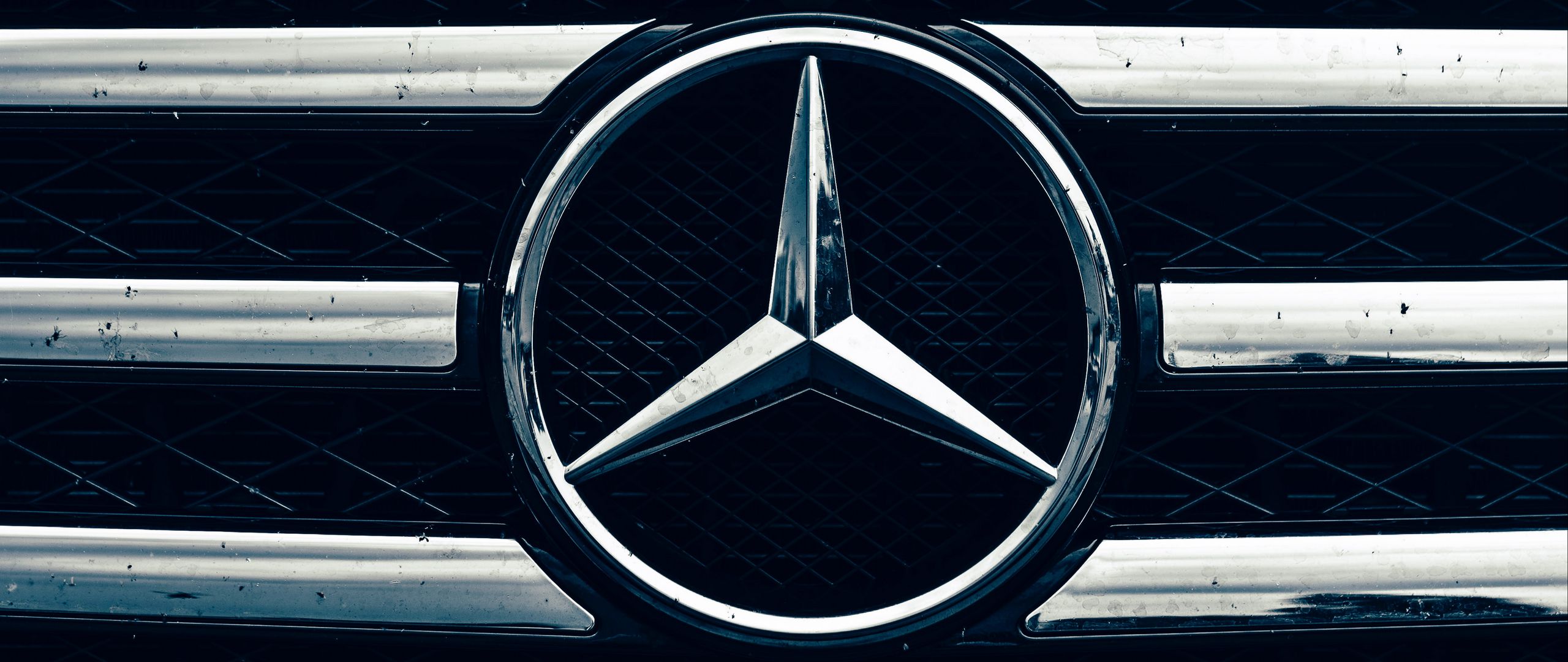 Как установить логотип авто на андроиде. Mercedes значок. Логотип Мерседес Гелендваген. Мерседес текстура. Обои с логотипами авто.