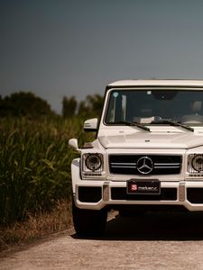 Превью обои mercedes-benz g63 amg, mercedes, машина, внедорожник, белый, вид спереди