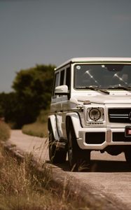 Превью обои mercedes-benz g 63 amg, mercedes, машина, внедорожник, белый, вид спереди