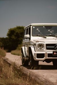 Превью обои mercedes-benz g 63 amg, mercedes, машина, внедорожник, белый, вид спереди