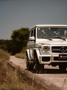 Превью обои mercedes-benz g 63 amg, mercedes, машина, внедорожник, белый, вид спереди