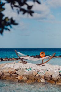 Превью обои море, пляж, гамак, камни, лето, отдых