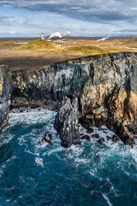 Превью обои море, скала, камни, маяк, природа