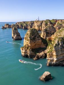 Превью обои море, скалы, горы, лодка, природа