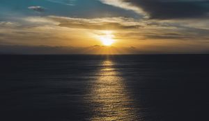 Превью обои море, закат, солнце, горизонт, рябь, волны