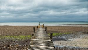 Превью обои мост, пирс, пляж, море, горизонт, облака, небо, пейзаж