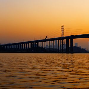 Превью обои мост, вода, закат, волны, сумерки