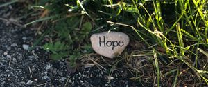 Превью обои надежда, надпись, трава, камень