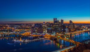 Превью обои небоскреб, город, мост, река, огни, ночь