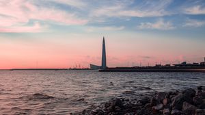 Превью обои небоскреб, побережье, море, сумерки