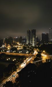 Превью обои небоскреб, здания, дорога, огни, город, ночь