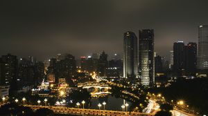 Превью обои небоскреб, здания, дорога, огни, город, ночь